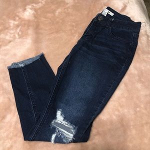 Distressed ankle jeans